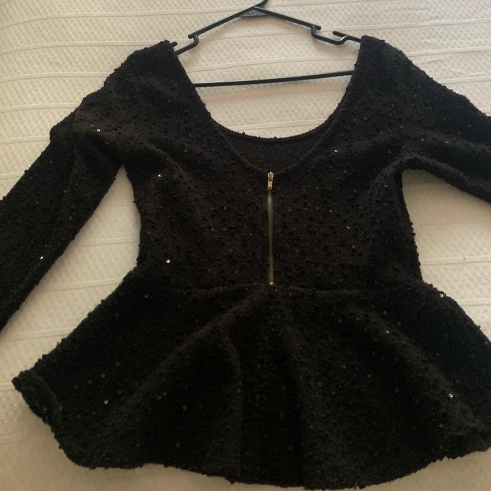 Black scoop neck dressy top!From a boutique store in London